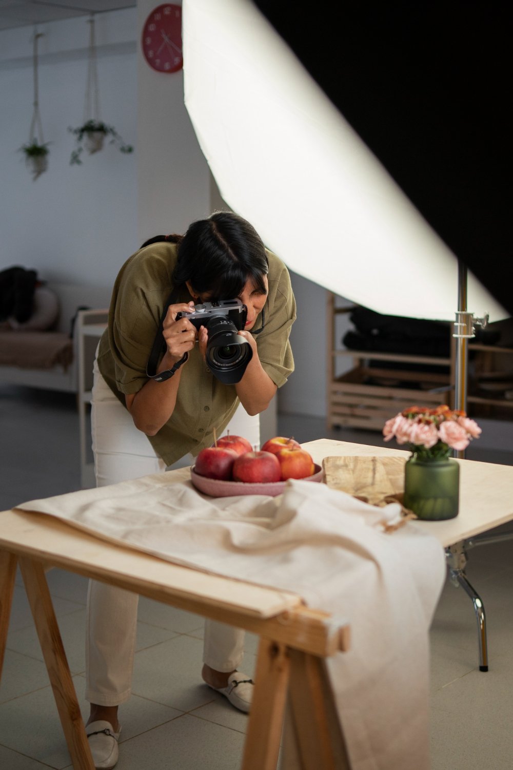 Professional product photographer taking photos for ecommerce product photography services.